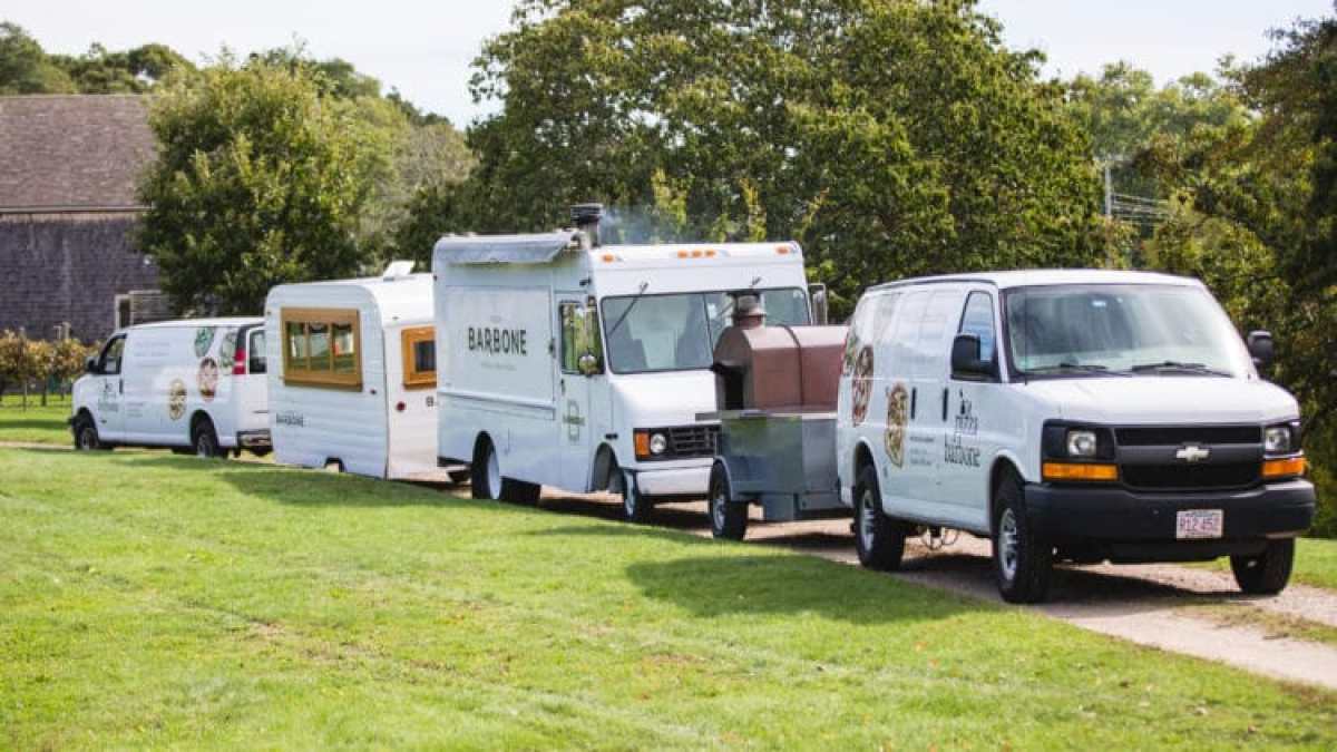 a truck is parked in the grass